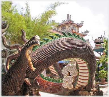 A coil of the dragon's body with a raised claw.