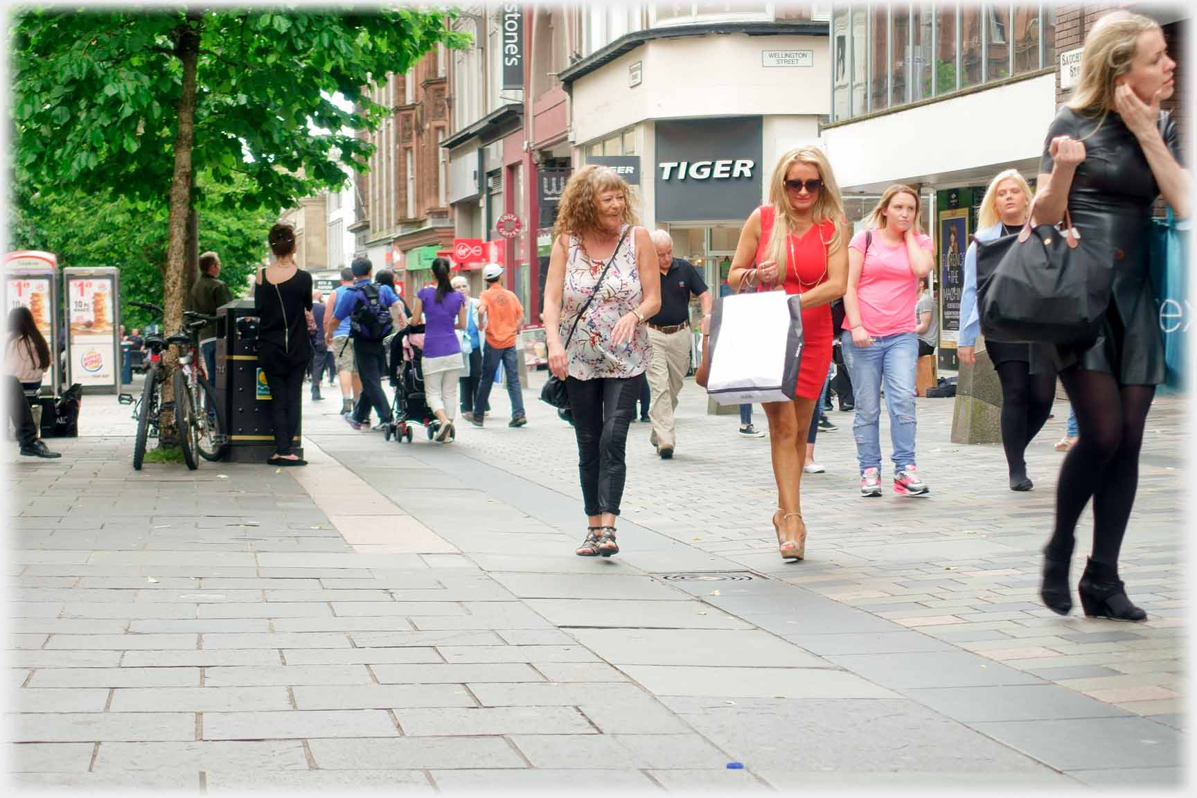 Women walking in pedestrianised street.