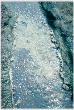 Stream with sulphurous deposits