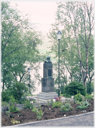 Bust overlooking fjord.