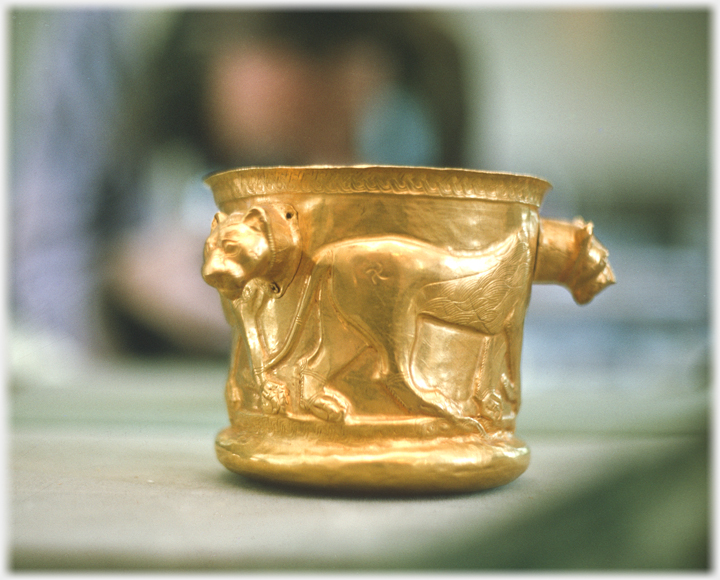 Golden goblet with three lions.