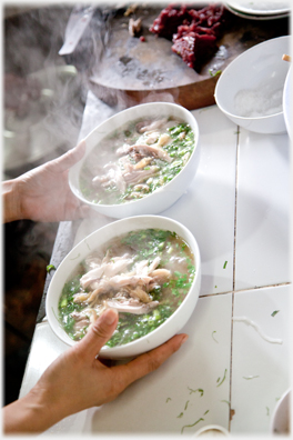 Two bowls of chicken pho.