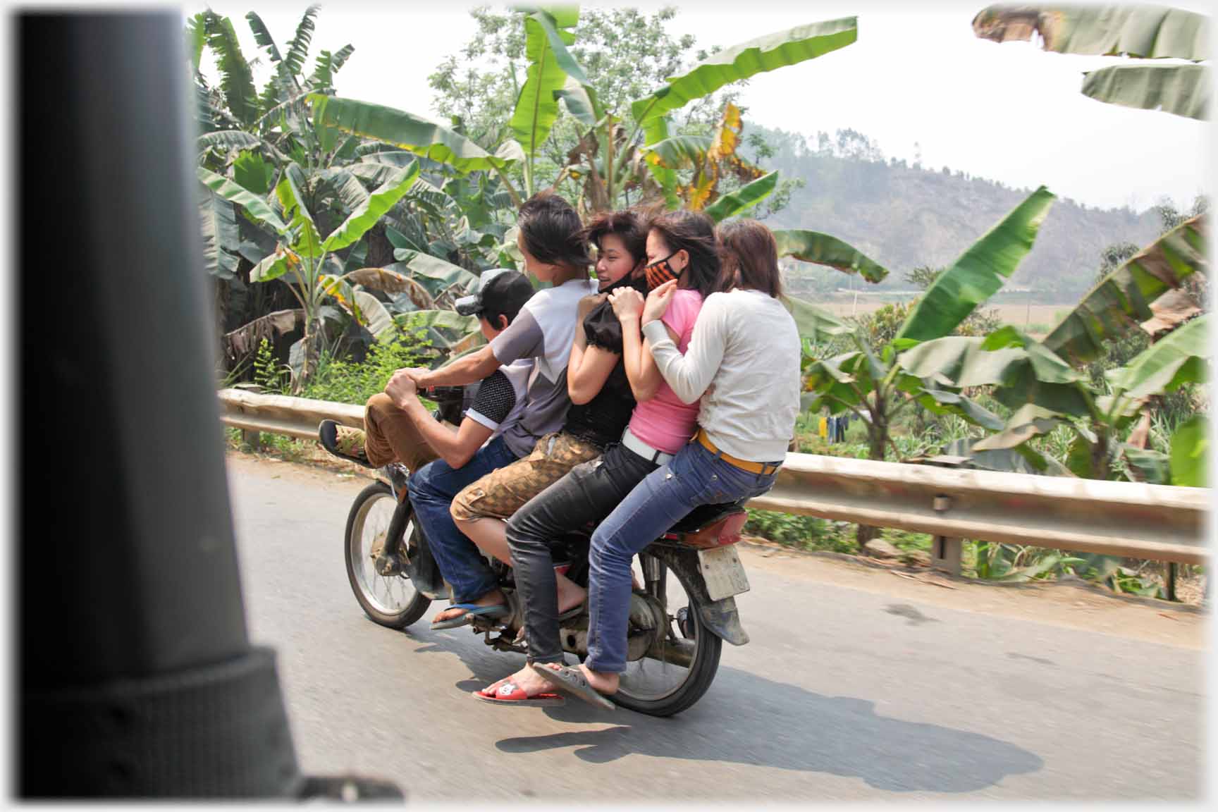 Five people on a motorbike.