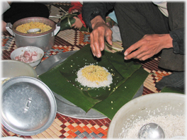 The cake is made on banana leaves.