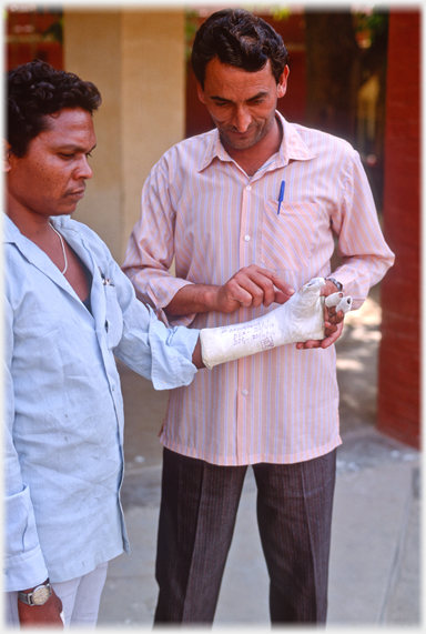 Patient with arm plaster cast.
