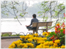 Man sitting meditating on bench by lake.