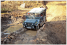 Jeep in deep mud ruts