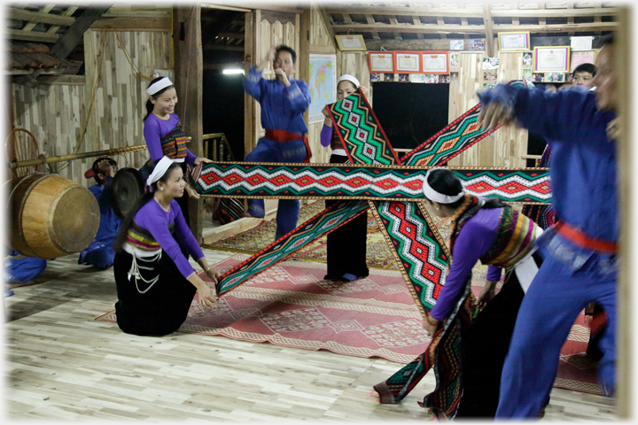 Elaborate dance with bands.