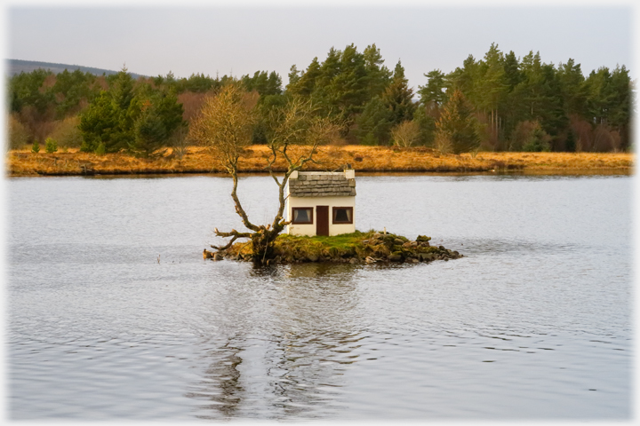 Model house on islet.