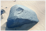 A boulder on an Icelandic beach.