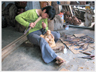 Man carving Buddha.