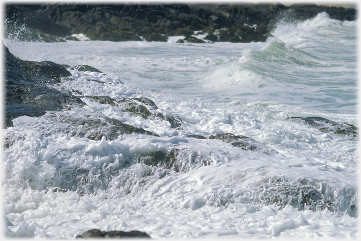 Waves around a rocky shore.