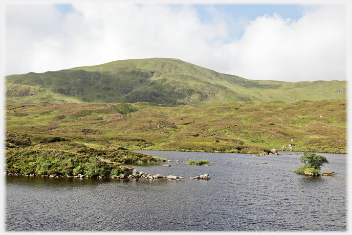 A corner of Loch Skeen with White Coomb rising behind it.