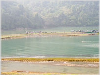 Visitors disembarking by Ba Be Lake.