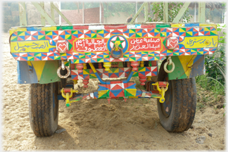 The decorated back of the cart.