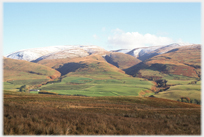 Range of snow capped hills.