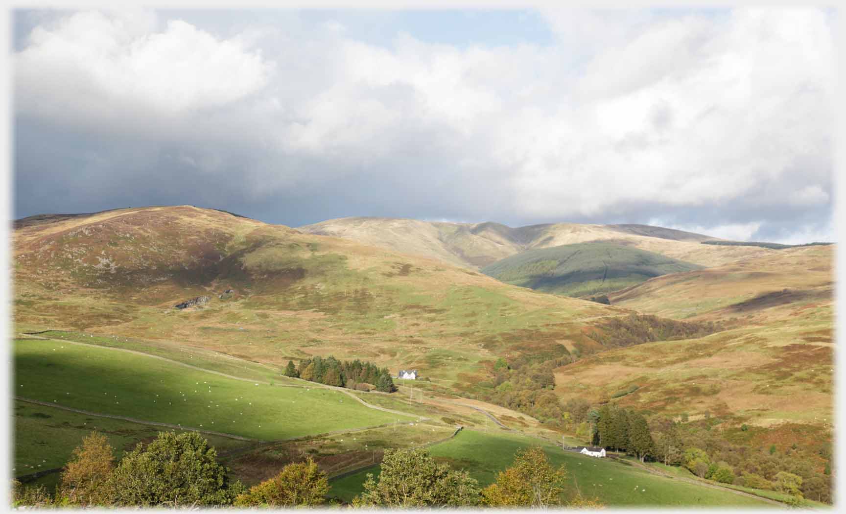 Larger more distant hill.