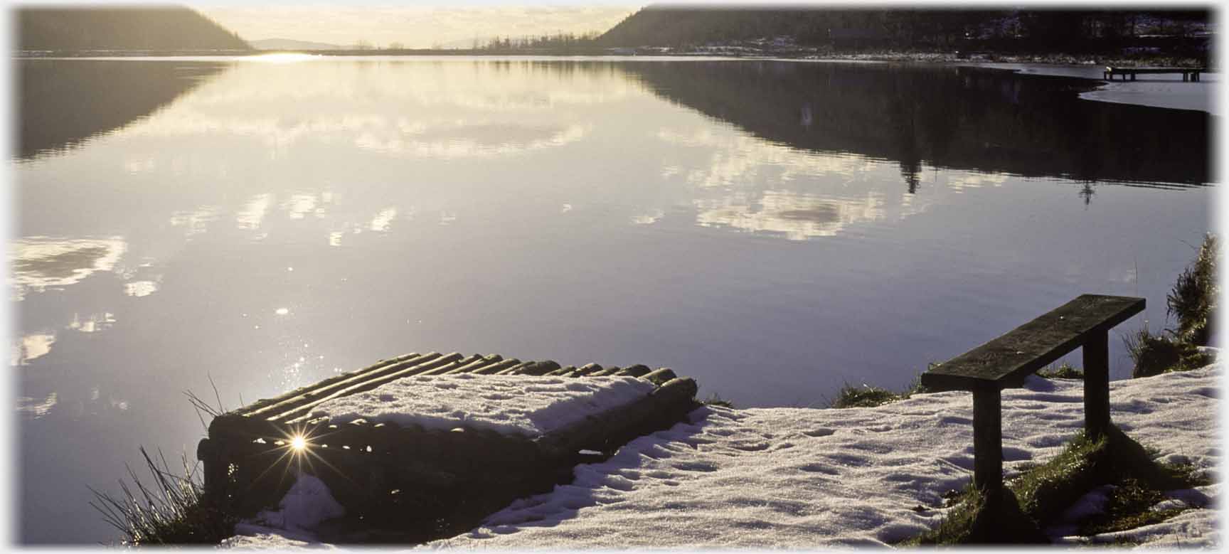 Simple plank seat by stage.