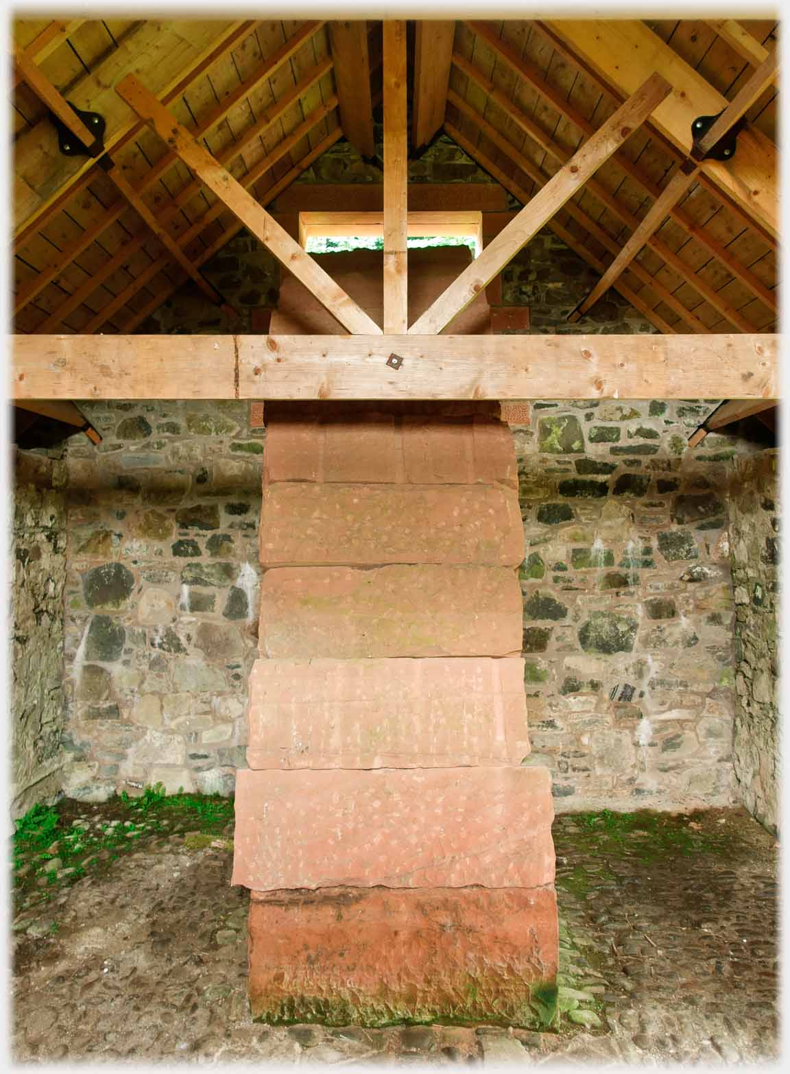 Inside the building the arch sits on the floor.