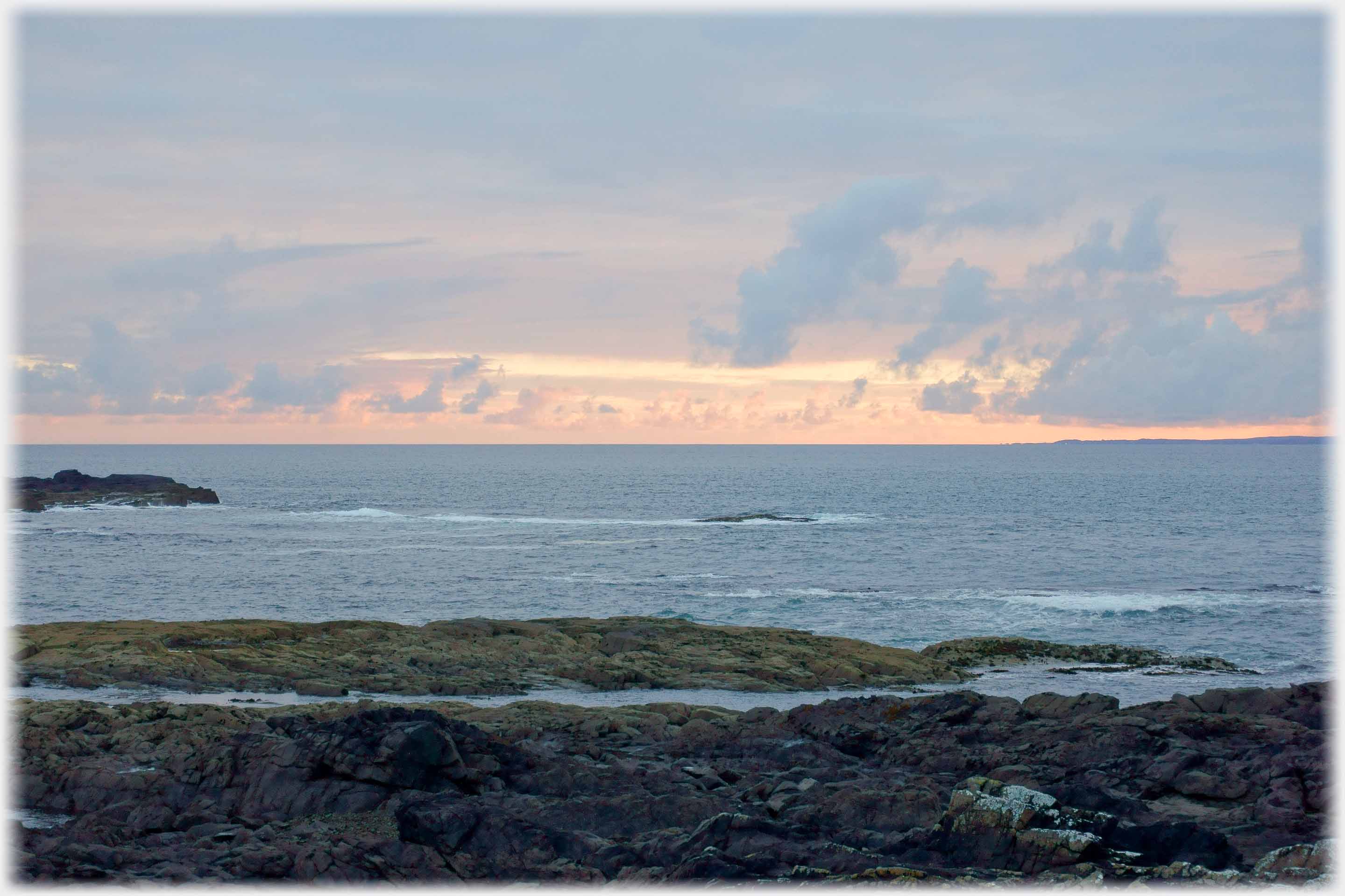 Colour deepening behind clouds.