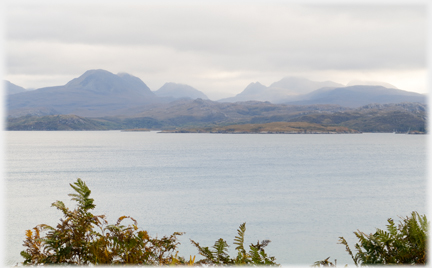 Loch with hillls beyond.