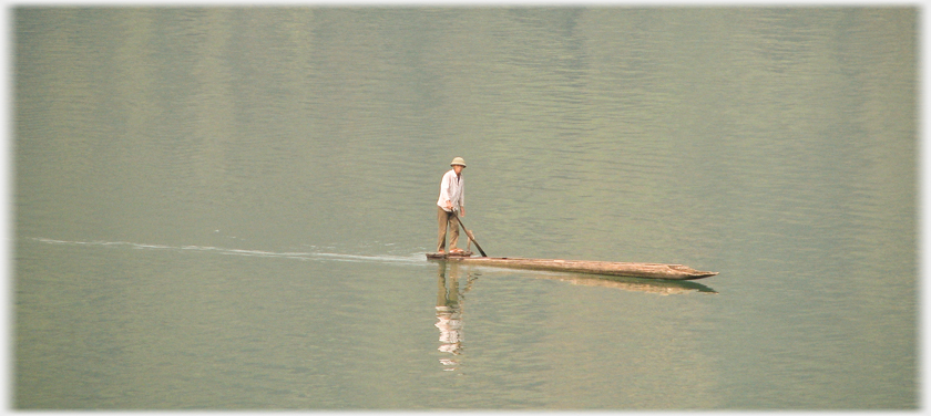 Man with side-scull.