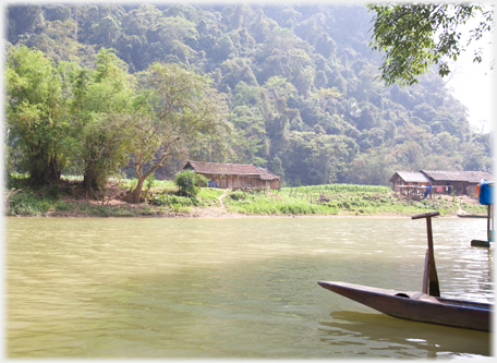 River, houses and boats.