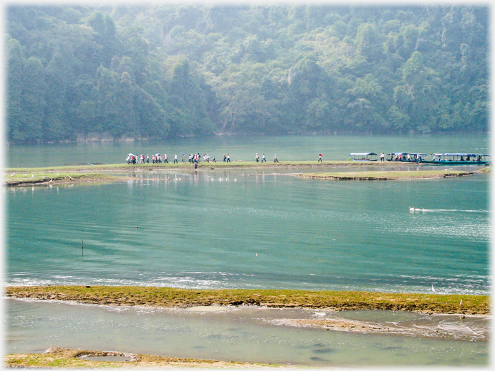 Visitors disembarking by Ba Be Lake.