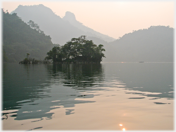 The same small island from different angle at evening.