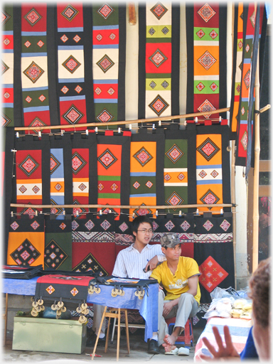 Embroidered hangings.