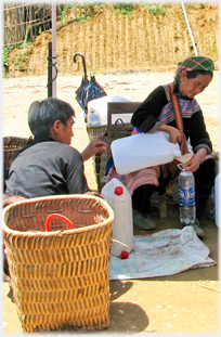 Woman dispensing liquid.