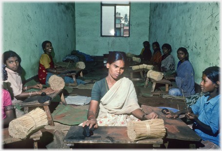 Women in work room for joss stick making.