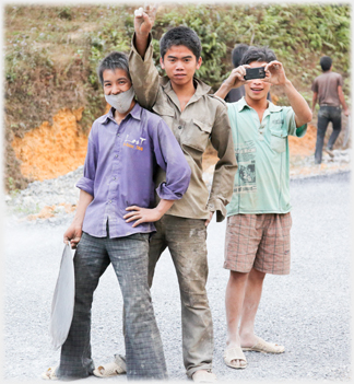 Workers posing for photographer.