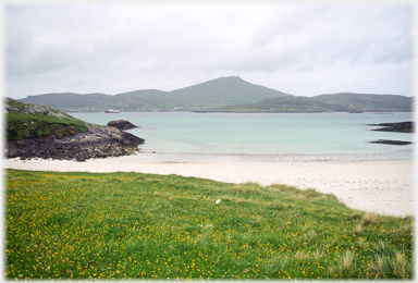 Beach on Vatersay looking towards Hartaval.