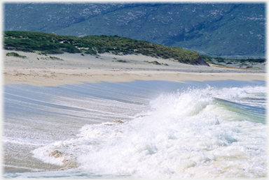 Wave retreating from the sand.