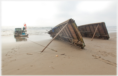 Flat boats propped up