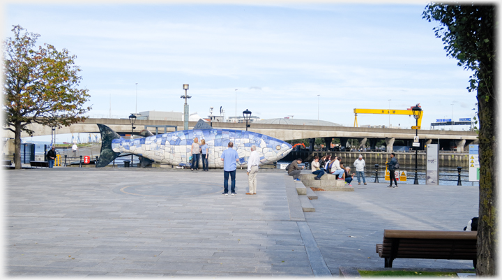 Big Fish and tourists with H + W behind.