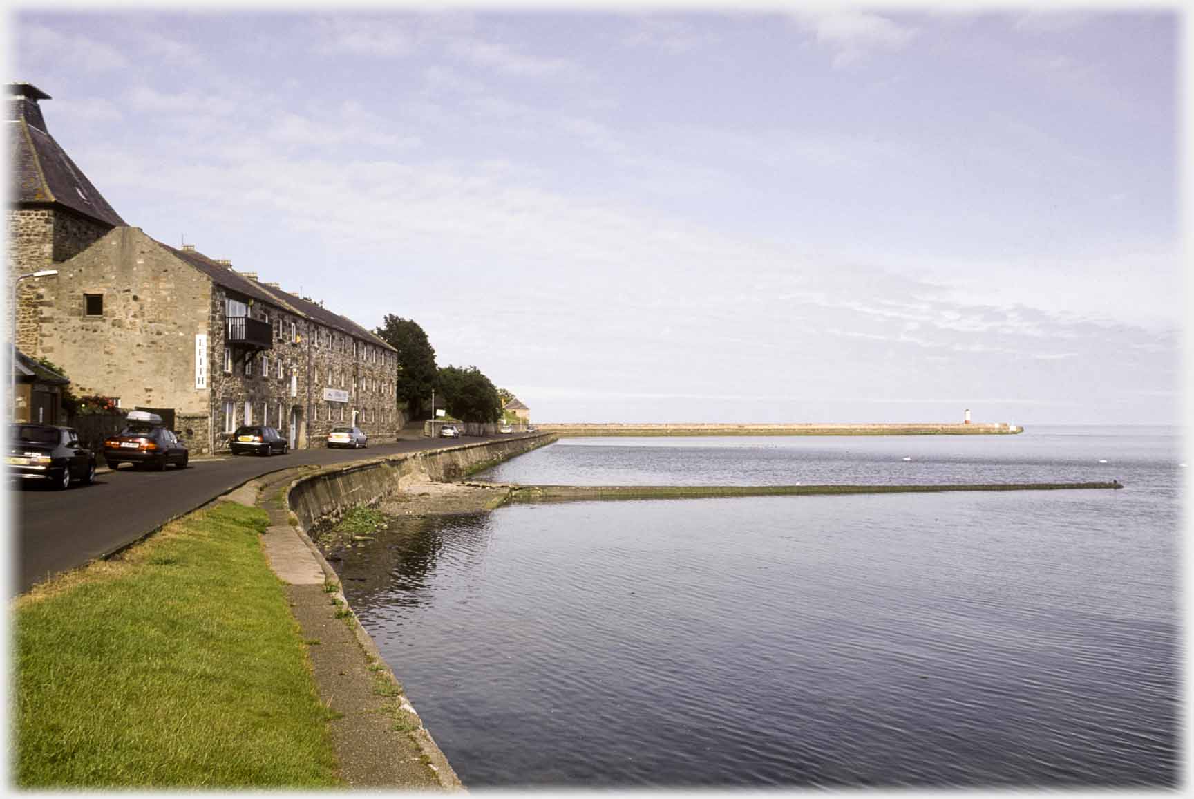 Houses by Pier Maltings with pier in distance.