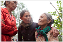 Three women talking.