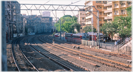 Railway lined with houses.