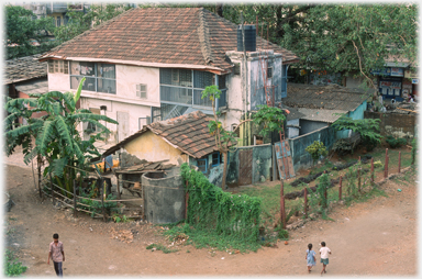 Small bungalow with balconies.