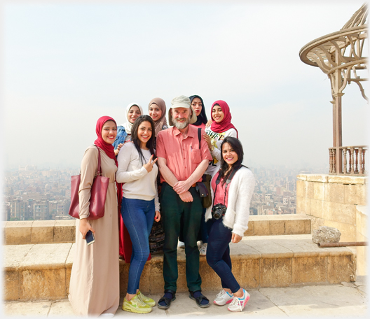 Photographer with group of women.