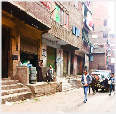 Street with donkey cart.