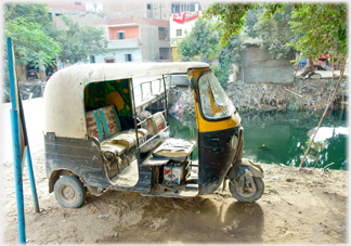 Dilapidated tuk-tuk.