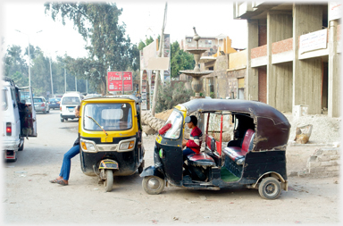 Tuk-tuks waiting for customers.