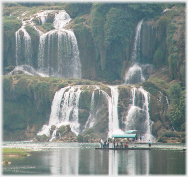 Cascade with punt in foreground.