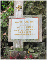 Concrete poster saying Ho Chi minh was here and worked here in early 1941.