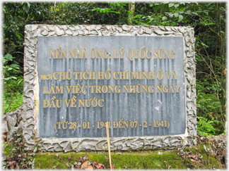 Decorated concrete plaque commemorating Ho Chi Minh's homecoming.