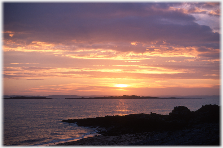 A tranquil setting sun over Murrays Isles.