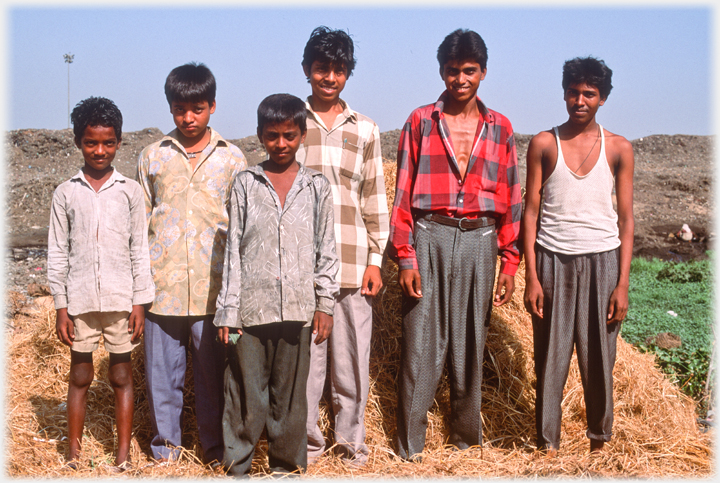 Men and boys posing.